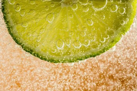 Lime in the bubbles Stock Photos