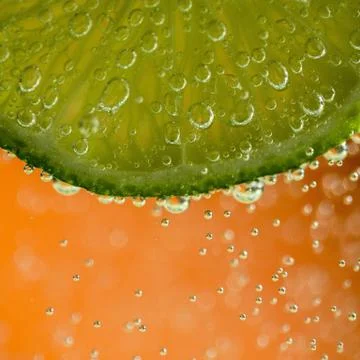 Lime in the bubbles Stock Photos