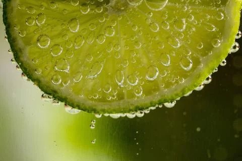 Lime in the bubbles Stock Photos