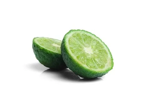 Lime closeup isolated on white background. Stock Photos
