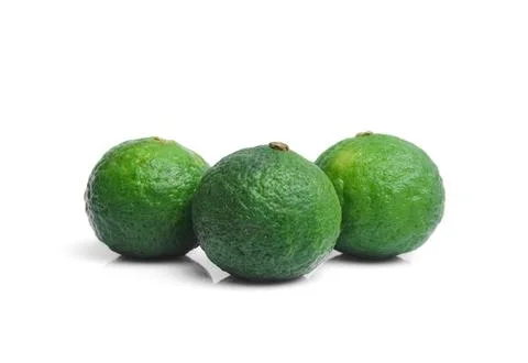 Lime closeup isolated on white background. Stock Photos