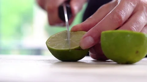 Lime cutting half Stock Footage 142514762