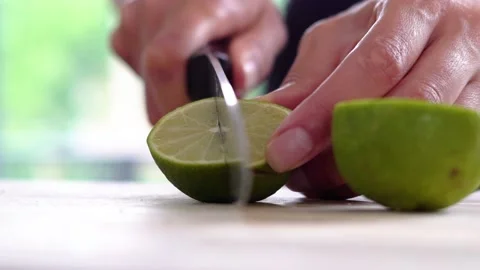 Lime cutting slow-motion Stock Footage 142515670
