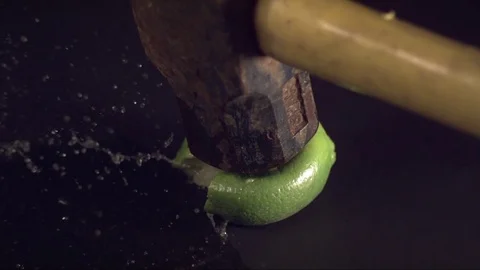 Lime Exploding in Slow Motion Stock Footage 82868447