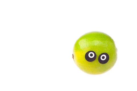 Lime with eyes and faces isolated on white Stock Photos