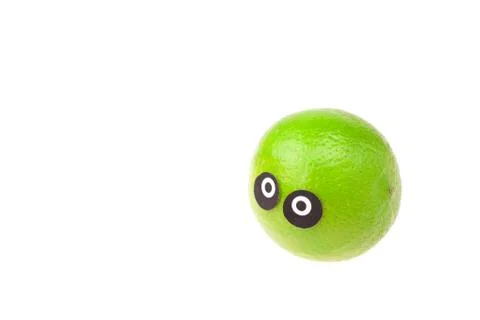 Lime with eyes and faces isolated on white Stock Photos