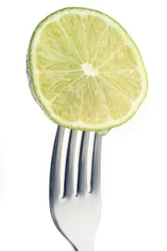 Lime on fork Stock Photos