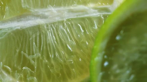 Lime fruit macro close up rotating camera motion stock footage Vídeo Stock 328507238