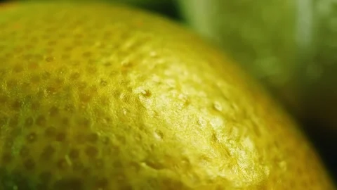 Lime fruit macro close up rotating camera motion stock footage Stock Footage 328507496