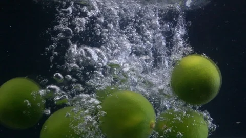 Lime fruit splash falling down water. Footage Stock Footage 111406987