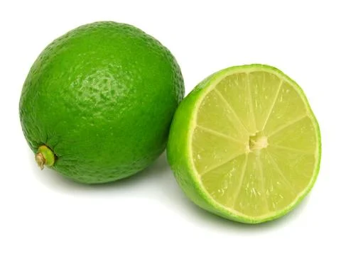 Lime fruit whole and half isolated on a white background. Creative juice co.. Stock Photos