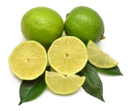 Lime fruit whole, half and slices with leaf isolated on a white background... Stock Photos