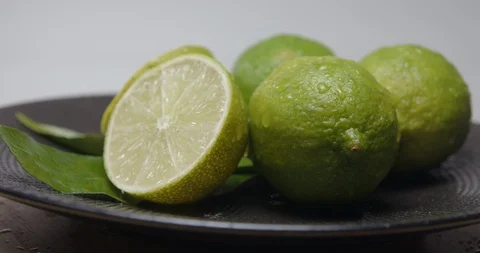 Lime green lemon rotating studio close-up Stock Footage 101476924