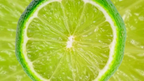 Lime half or slice scaling in minimal motion graphic seamless looping animation Stock Footage 202002957