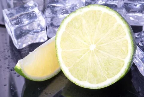 Lime with ice cubes Stock Photos