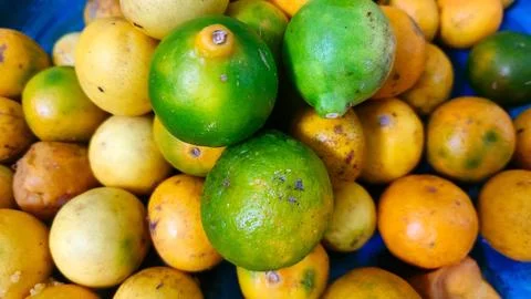 Lime improves digestion, boosts immunity, and has antioxidants for skin health. Stock Photos