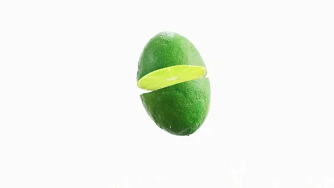 Lime jumping in slow motion with juice coming out on white Vídeos de archivo 144927283