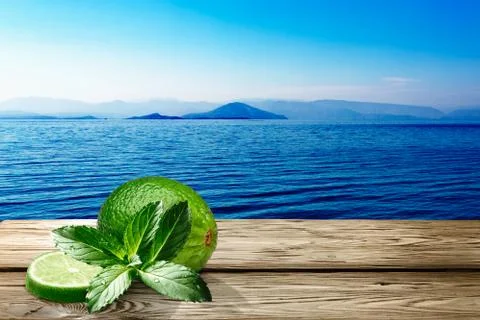 Lime with mint wooden table Stock Photos