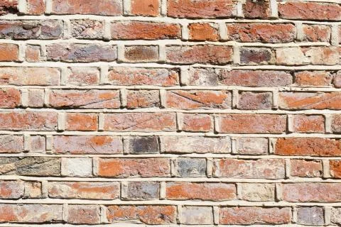 Lime mortar brick wall background Stock Photos