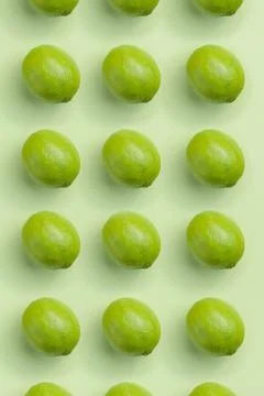 Lime pattern on a green background Stock Photos