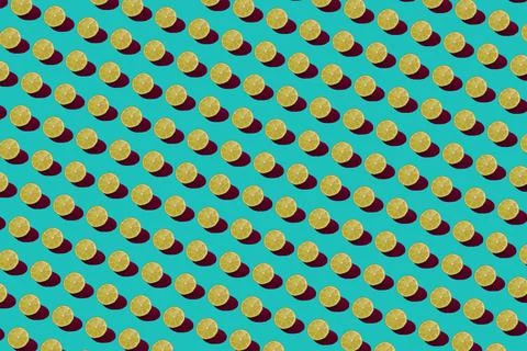 Lime pattern on a green background. Pop art design, creative citruses. Yellow Stock Photos