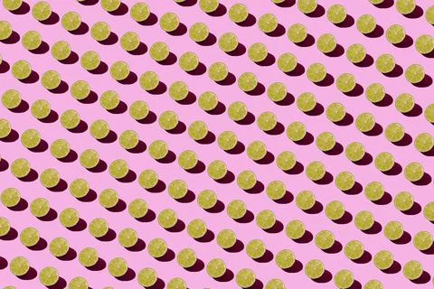 Lime pattern on a pink background. Pop art design, creative citruses. Yellow Stock Photos