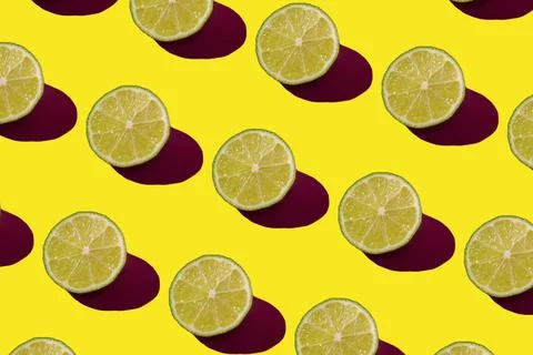 Lime pattern on a yellow background. Pop art design, creative citruses. Yellow Stock Illustration