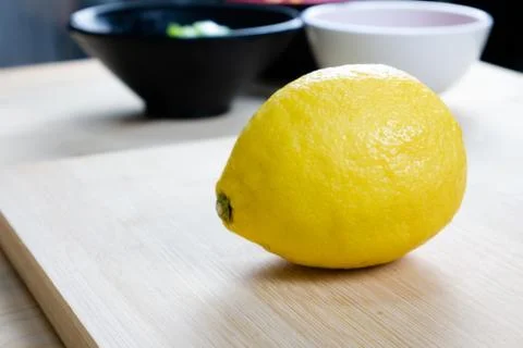Lime is placed on a cutting board Stock Photos