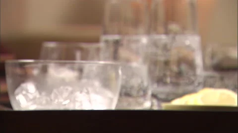 Lime put into glasses of water. Stock Footage 46869631