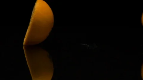 Lime rolls out on a black table Stock-Footage 80605145