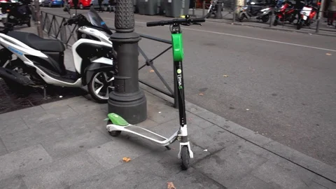 Lime s electric sharing scooter parked Stock Footage 97498063