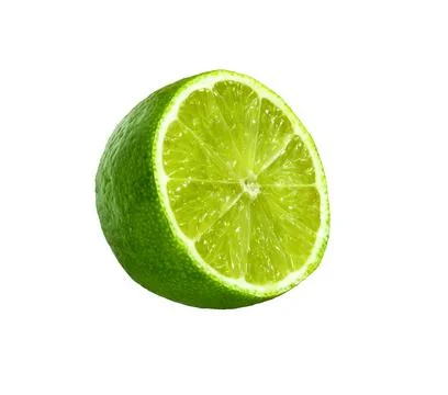 Lime slice. Juicy slice of lime. Ripe green lime citrus fruit. Stock Photos