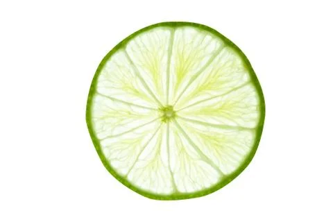 Lime slice top view. Fruit isolated on white background. With clipping path. Stock Photos