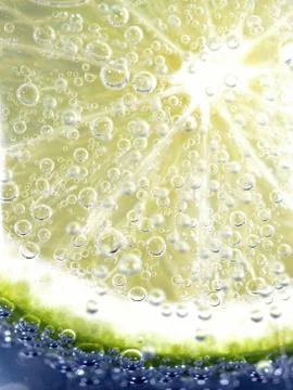 Lime in sparkling water Foto stock