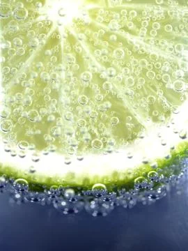 Lime in sparkling water Foto stock