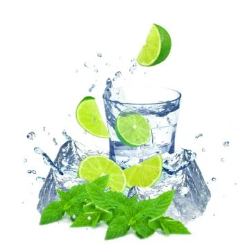 Lime splash on white background Stock Photos