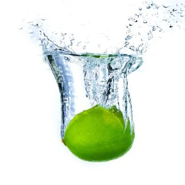 Lime splashing Stock Photos