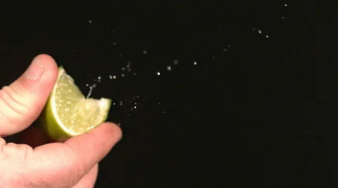 Lime Squeeze in Super Slow Motion Stock Footage