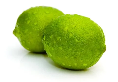 Lime with water drops Stock Photos