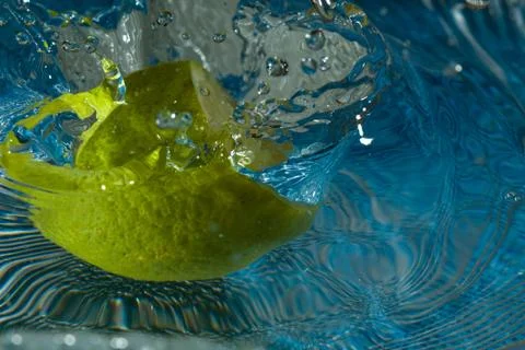 Lime with water drops Stock Photos
