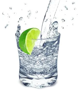Lime water splash Stock Photos