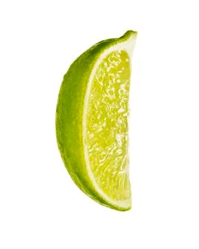 Lime wedge on white background. Stock Photos