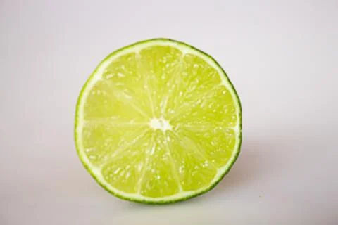 Lime on a white Stockfoto's