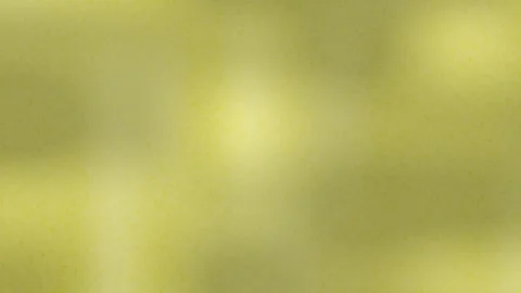 Lime yellow and olive green textured surface with soft grainy dots. 2d animation Stock Footage 346366994