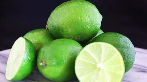 Limes and half lime rotating Stock Footage 48756179