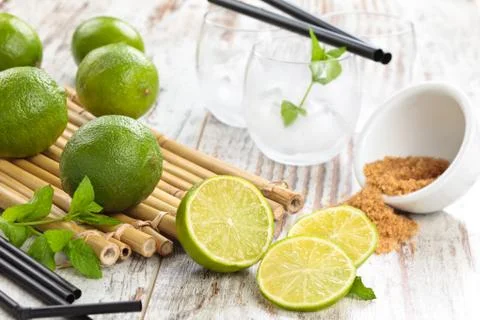 Limes and mint. Stock Photos
