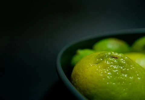 Limes on a dark background 写真素材