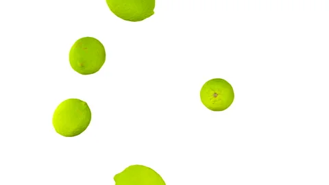 Limes falling down in slow motion on white background. 스톡 동영상 252362317