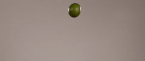 Limes Falling In Slow Motion 스톡 동영상 105377314