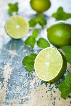 Limes with mint Stock Photos